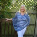 Ocean Kiss Crochet Poncho Pattern from Crochet247 featuring Lion Brand Shawl in a Ball