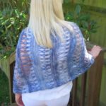 Ocean Kiss Crochet Poncho Pattern from Crochet247 featuring Lion Brand Shawl in a Ball