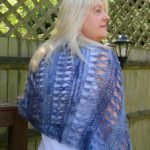 Ocean Kiss Crochet Poncho Pattern from Crochet247 featuring Lion Brand Shawl in a Ball